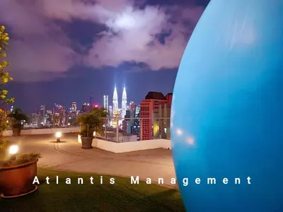 a view of a city skyline at night with a surfboard at TR Residence Block A,Titiwangsa in Kuala Lumpur