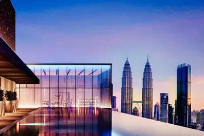 a building with a view of a city skyline at CORE TRX Suites in Kuala Lumpur