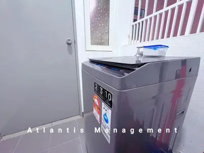 a trash can sitting in front of a house at TR Residence Cozy & Luxury Apartment, Walking Distance MRT Titiwangsa & Nearby Titiwangsa Lake Garden in Kuala Lumpur