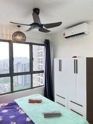 a bedroom with a bed and a ceiling fan at Cozy Kenwingston Platz KL 2-5 Pax2BR&2BR PakinNetf 4305A in Kuala Lumpur