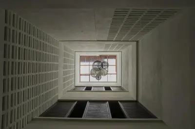a room with a window and a fan at Redstone Boutique Hotel Kuala Lumpur in Kuala Lumpur