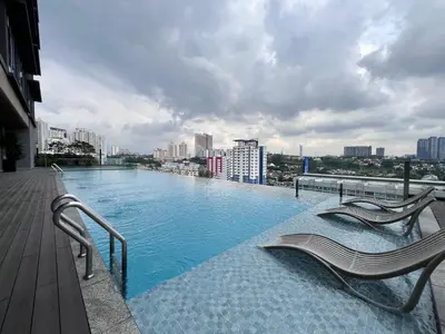 a swimming pool on the roof of a building at Societe Hartamas Kuala Lumpur in Kuala Lumpur