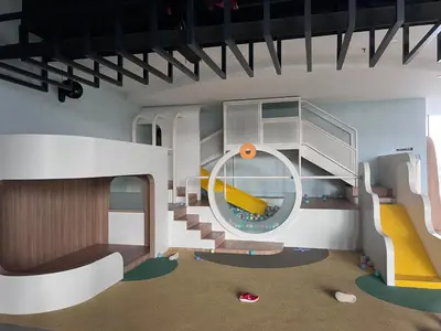 a childrens play room with a slide and a playground at Societe Hartamas Kuala Lumpur in Kuala Lumpur