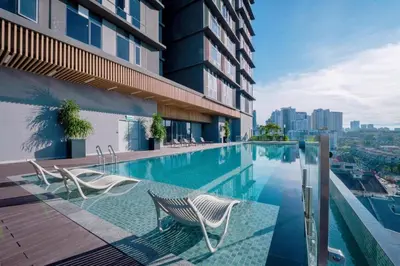 a swimming pool on the roof of a building at Societe Hartamas Kuala Lumpur in Kuala Lumpur