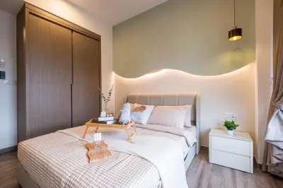 a bedroom with two beds and a wooden headboard at Agile Bukit Bintang by Feel Home in Kuala Lumpur
