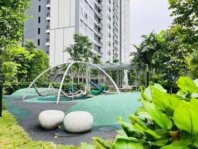 a playground in a park with a swing at Agile Bukit Bintang by DeUrban in Kuala Lumpur