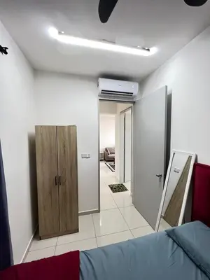 a room with a bed and a hallway with sliding doors at Cozy Kenwingston Platz KL 2-5 Pax2BR & 2BR FrePakin Netflix 3803 in Kuala Lumpur