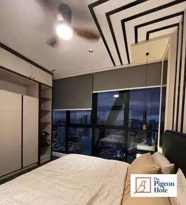 a bedroom with a bed and a large window at KLCC Scarletz Executive Suite by ThePigeonHole in Kuala Lumpur