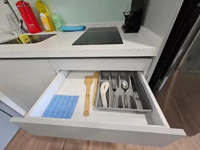 a drawer in a kitchen with utensils in it at Riveria City by Nomadnest in Kuala Lumpur