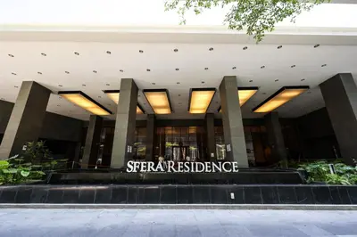 a large building with a sign that reads sears resistance at 188 Suites Kuala Lumpur in Kuala Lumpur
