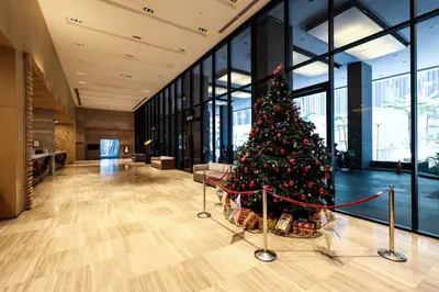 a christmas tree in the middle of a lobby at 188 Suites Kuala Lumpur in Kuala Lumpur