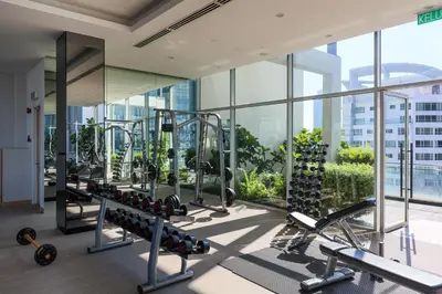 a gym with cardio equipment in a building at 188 Suites Kuala Lumpur in Kuala Lumpur