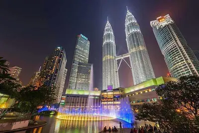 a group of tall skyscrapers in a city at night at M Centura Sentul Kuala Lumpur, Fully Air-Con 2-Bedroom Home in Kuala Lumpur