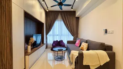 a living room with a couch and a tv at M Centura Sentul Kuala Lumpur, Fully Air-Con 2-Bedroom Home in Kuala Lumpur