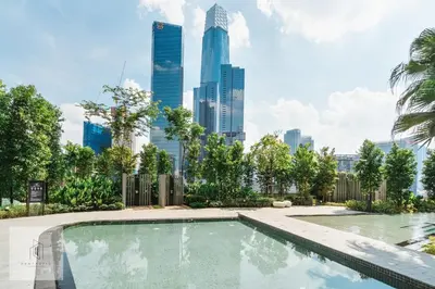 a swimming pool with a city skyline in the background at Agile Bukit Bintang by Fantastic Home in Kuala Lumpur