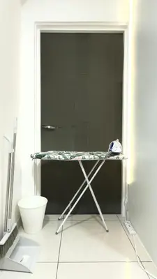 a table in a room with a toilet at The Home by Fidi at Continew Residence in Kuala Lumpur
