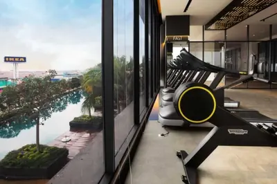 a hotel lobby with a view of a river at The Home by Fidi at Continew Residence in Kuala Lumpur