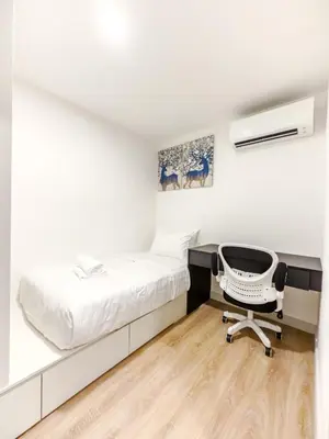 a bedroom with a bed and a desk and a chair at The Atrium at Jalan Ampang by OKBnB - 3Bedroom Apartment with FREE WiFi & Carpark in Kuala Lumpur