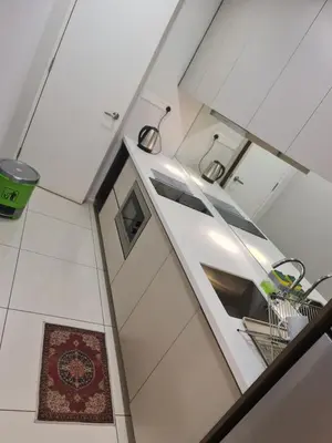 a bathroom with a sink in a room at THE ROBERSTSON RESIDENT WITH VIEW Kuala Lumpur in Kuala Lumpur