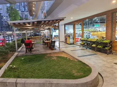 a store front with a table and chairs and a table sidx sidx at THE ROBERSTSON RESIDENT WITH VIEW Kuala Lumpur in Kuala Lumpur