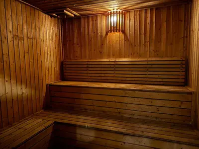 a wooden sauna with a light on top of it at Times Square Service Suites KL, Fortune in Kuala Lumpur