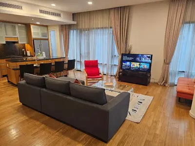 a living room with a couch and a tv at Urban Oasis at St Mary klcc 1Bed2bath in Kuala Lumpur