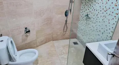 a bathroom with a shower and a toilet and a sink at Regalia Skypool KLCC Dorms By Tasrifa in Kuala Lumpur