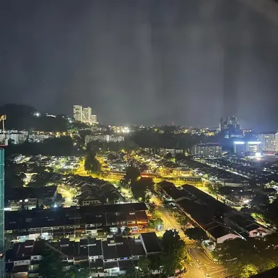 a city lit up at night with lights at EKO CHERAS mall kids play room Big sofa MRT 8 pex in Kuala Lumpur