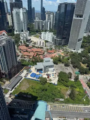 an aerial view of a city with tall buildings at Agile Bukit Bintang by SOD in Kuala Lumpur