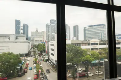 a view of a busy city street from a window at De Royal Hotel in Ampang