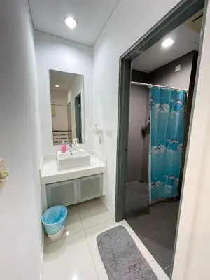 a bathroom with a sink and a shower at SP Home At Mercu Summer Suites in Kuala Lumpur