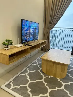 a living room with a large television and a table at Muji Feel Sunway Velocity 2 Link to Mall 2Br in Kuala Lumpur