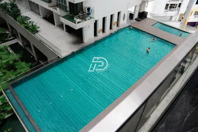an overhead view of a swimming pool in a building at Best View Hostel Regalia KLCC in Kuala Lumpur