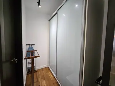 a glass door leading to a hallway with a lamp at Nyiur Premier Residence Ampang Near KLCC Kuala Lumpur in Kuala Lumpur