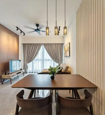 a dining room with a table and a couch at Central of KL 1-5px - 10 mins TRX and Bukit Bintang in Kuala Lumpur