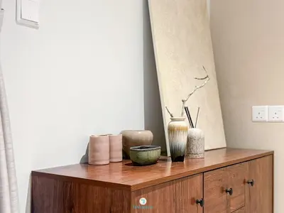 a wooden cabinet with vases on top of it at Japandi Studio w Bathtub - Linked to Quill City Mall in Kuala Lumpur
