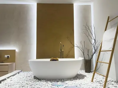 a bathroom with a white tub on a pile of rocks at Japandi Studio w Bathtub - Linked to Quill City Mall in Kuala Lumpur