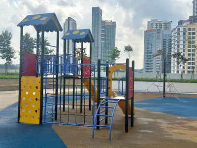 a playground in a park with a slide at 3BR Vintage design Level 26, KL Sentral City View in Kuala Lumpur