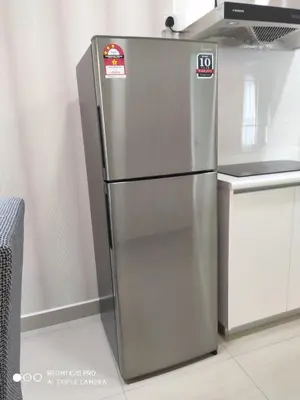a stainless steel refrigerator with two doors in a kitchen at Best & Affordable KL Arte Plus 2 bedroom Homestay in Kuala Lumpur