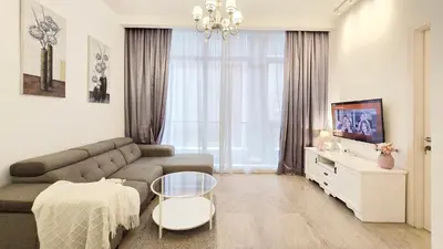 a living room with a couch and a table at Bukit Bintang Fairlane Residence Pavilion KLCC #A25 in Kuala Lumpur