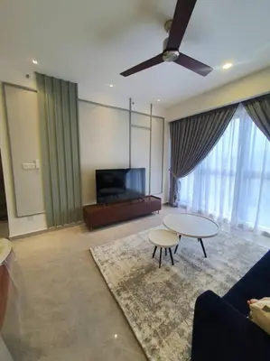 a living room with a couch and a table at Agile Bukit Bintang TRX Pavilion KL by WSD in Kuala Lumpur