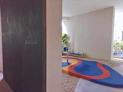 a room with a table in the corner of a room at Eaton Residence KLCC Elite Suites in Kuala Lumpur