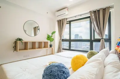 a bedroom with a bed with stuffed animals on it at KidsCastle Bukit Bintang Slide Family Friendly in Kuala Lumpur