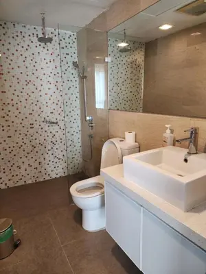 a bathroom with a sink and a toilet and a shower at Regalia Suites Best Couples Studio KLCC in Kuala Lumpur