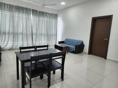 a living room with a table and chairs and a couch at Regalia Suites Best Couples Studio KLCC in Kuala Lumpur