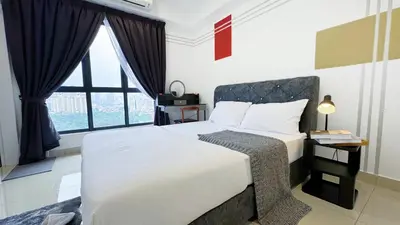 a bedroom with a large bed with a large window at Vista Sentul Residences, 3-Bedroom Fully Air-Con Suite, SENTUL in Kuala Lumpur