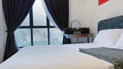 a bedroom with a bed and a large window at Vista Sentul Residences, 3-Bedroom Fully Air-Con Suite, SENTUL in Kuala Lumpur