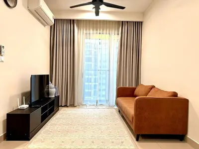 a living room with a couch and a television at The Elman new home in Setiawangsa in Kuala Lumpur