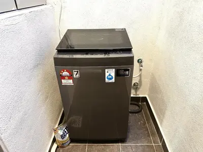 a trash can sitting in a corner of a room at The Elman new home in Setiawangsa in Kuala Lumpur