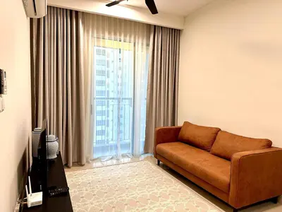 a living room with a couch and a large window at The Elman new home in Setiawangsa in Kuala Lumpur
